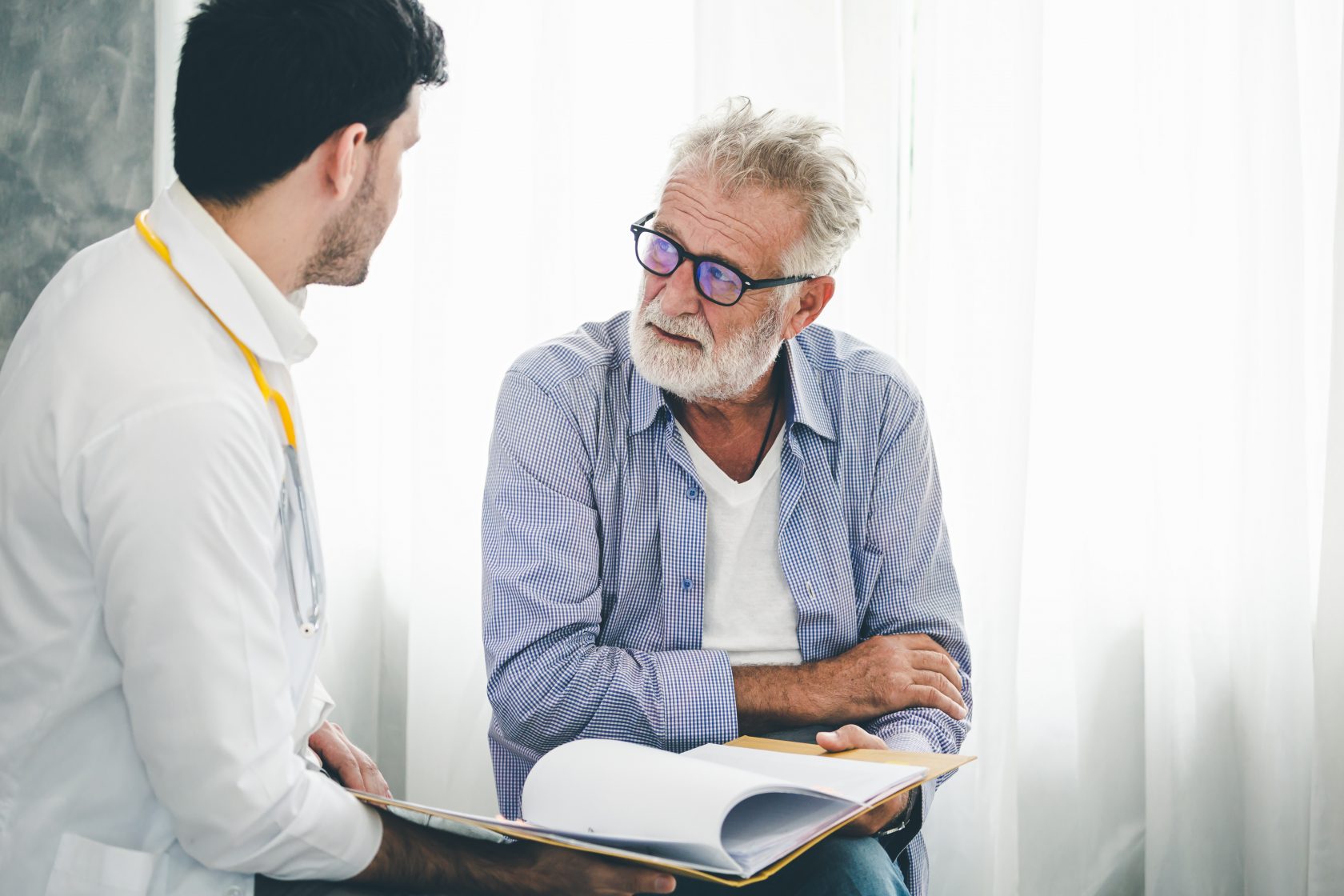 Psychologist doctor discussing with patient